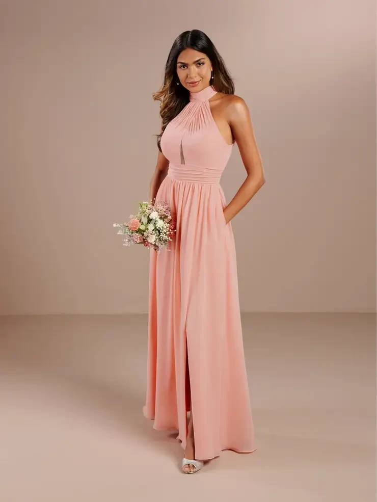 model is wearing a light pink sleeveless a-line bridesmaid dress